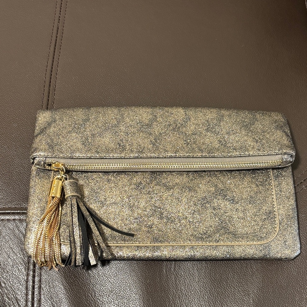 Elegant Gold Clutch with Tassel